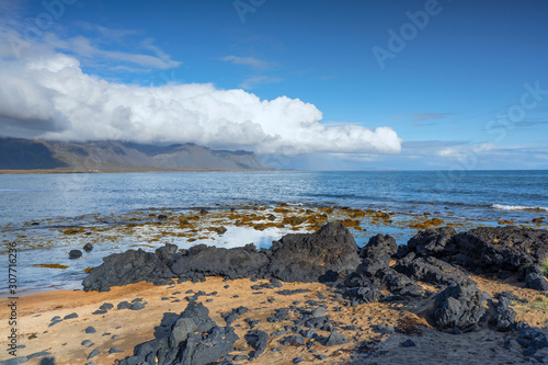 the only red beach in Iceland is the beach of Budir, covered from black volcanic rocks, landscape photography