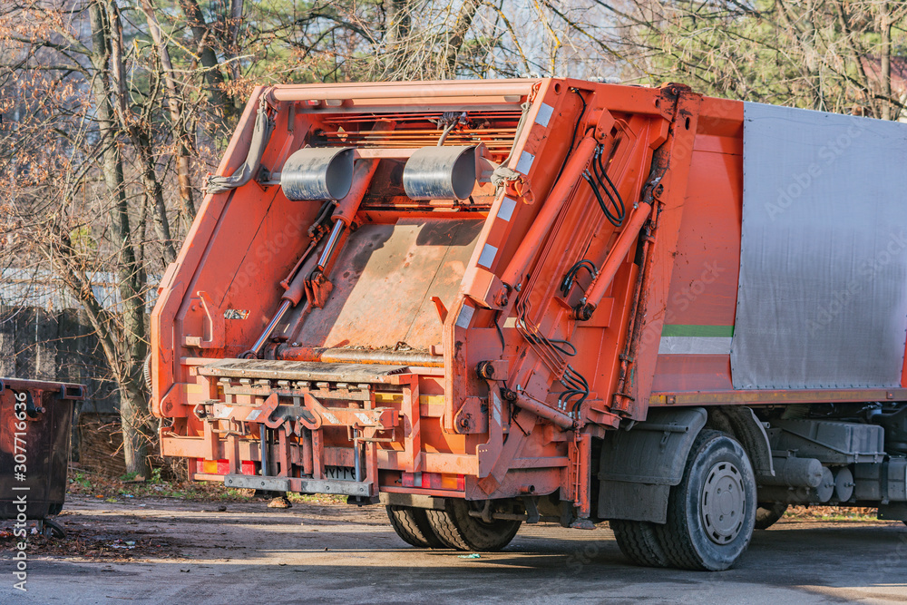 Process of garbage loading to the garbage truck. Process of garbage loading to the garbage truck.