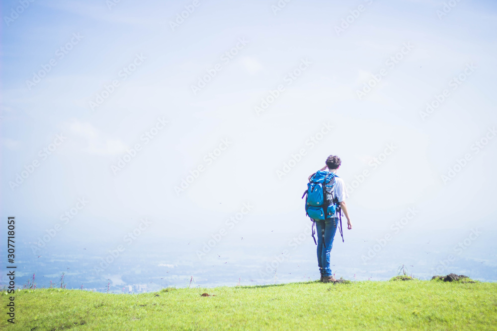 girl walking on mountain field