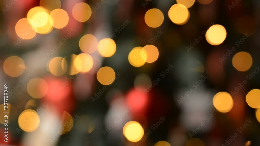 Holiday concept backdrop with twinkling bright shapes. Blinking Christmas Tree lights. Abstract Blurred Christmas Lights Bokeh Background. Christmas Tree Lights Twinkling. Winter Holidays Concept. Holiday concept backdrop with twinkling bright shapes. Blinking Christmas Tree lights. Abstract Blurred Christmas Lights Bokeh Background. Christmas Tree Lights Twinkling. Winter Holidays Concept.