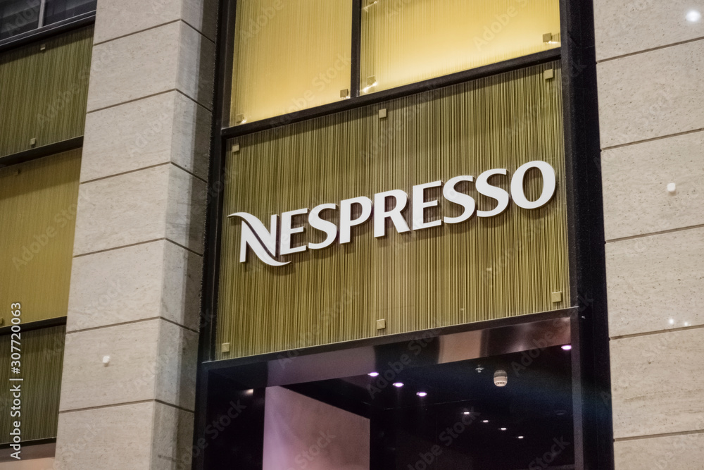 Nespresso shop in the city center mall. Signage window of famous coffee  machine brand store in Dubai foto de Stock | Adobe Stock