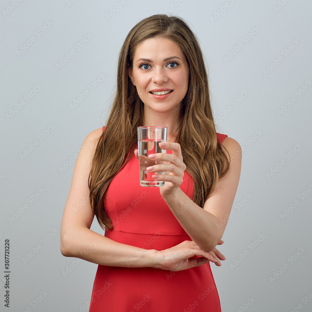 woman in red dress holding water glass woman in red dress holding water glass