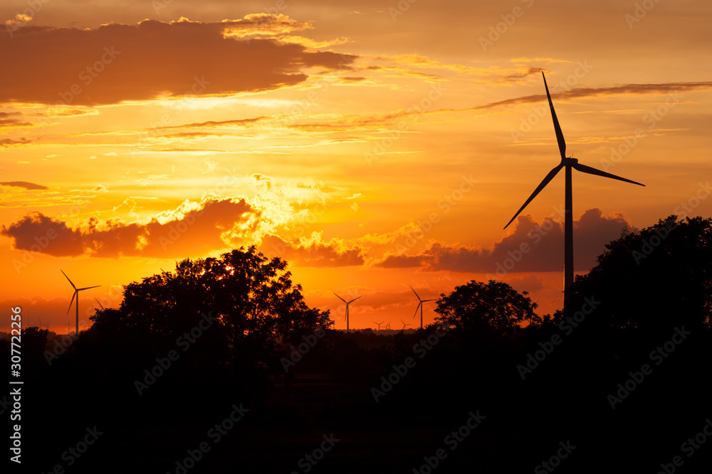 Obraz premium Windmills at Sunset