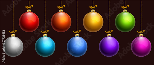 Set of realistic glass baubles of different color (rainbow colors plus silver and magenta). Suitable for use on both dark and light backgrounds. Decorative element (isolated objects).