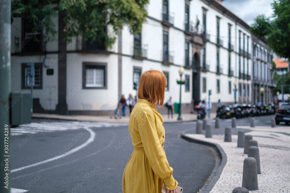Fototapeta premium woman walking on the street