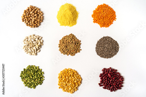Top view the assortment of peas, lentils and legumes isolated on white background.