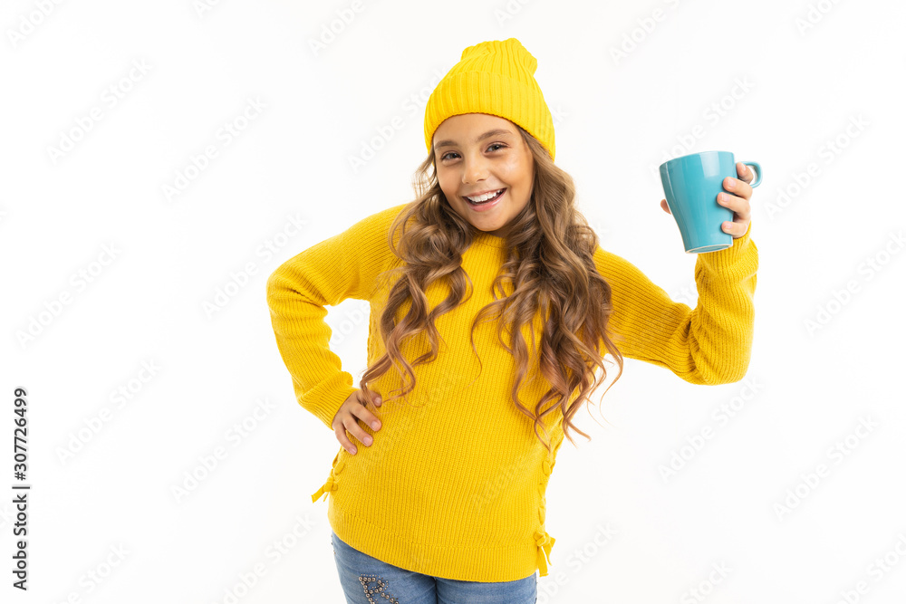 European young girl holding a mug on a white background European young girl holding a mug on a white background
