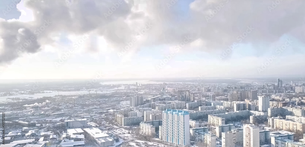 Winter city, high-rise residential development, frost in city.