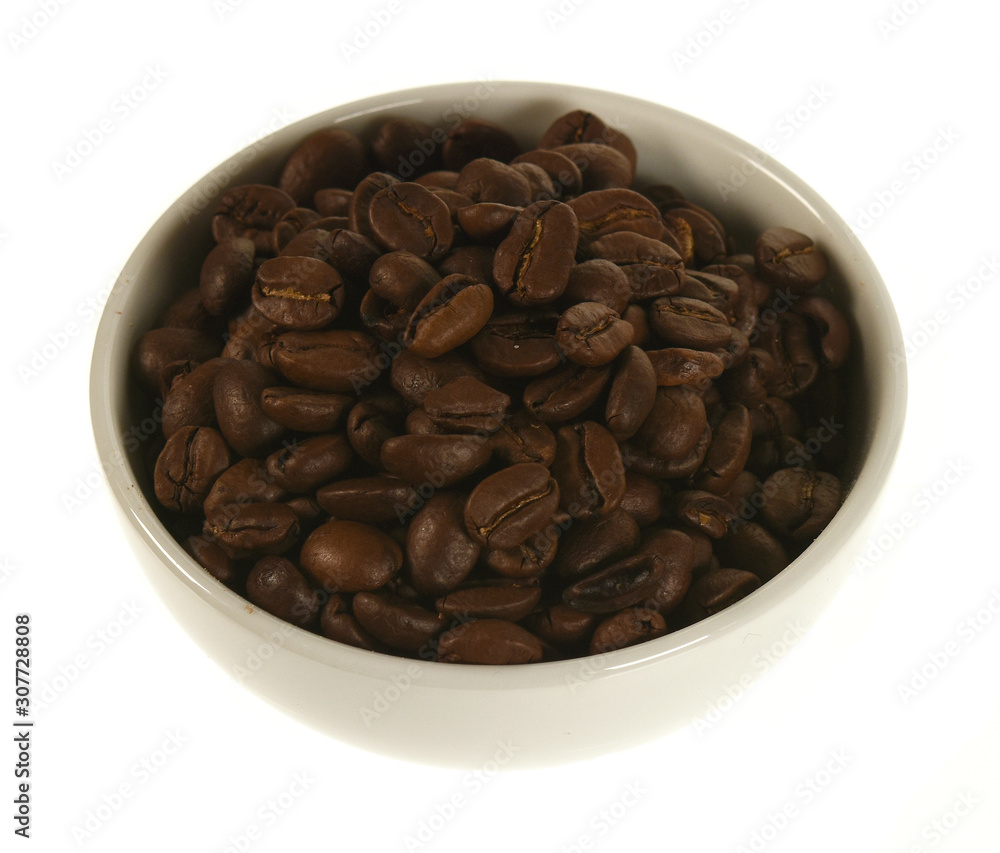 coffee beans in a cup isolated on white