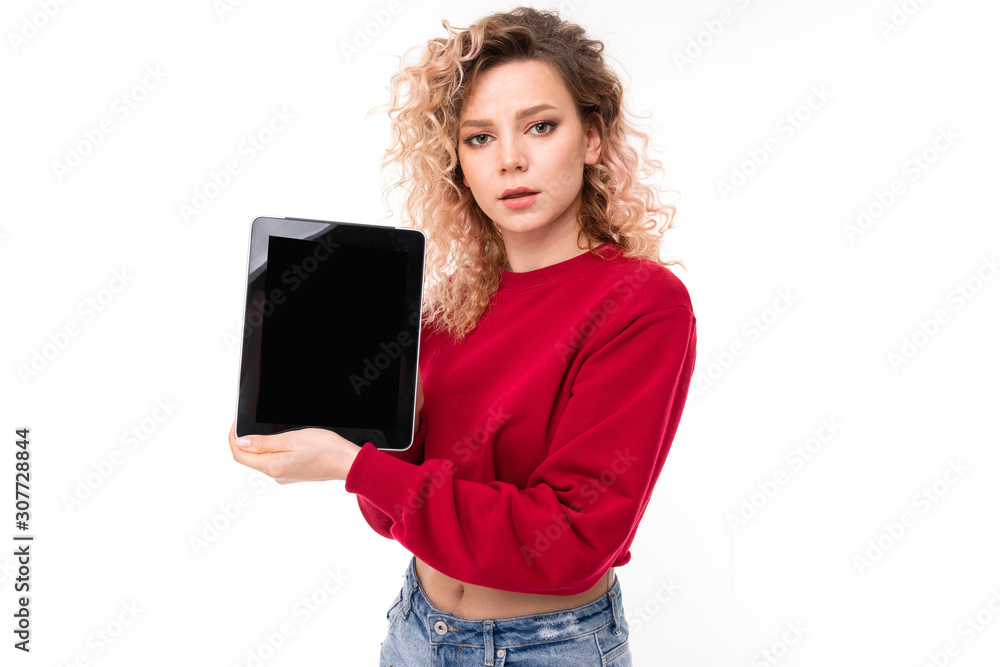 attractive girl holding a tablet with mockup in her hands with the screen forward on a white background attractive girl holding a tablet with mockup in her hands with the screen forward on a white background