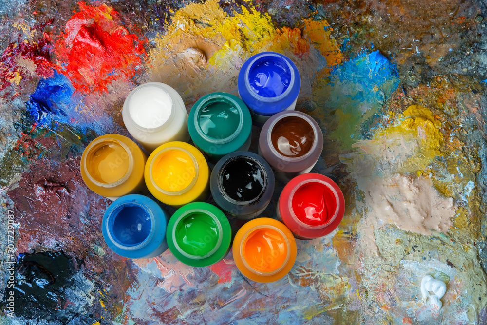 Acrylic paints in the plastic containers on the palette Stock Photo | Adobe  Stock