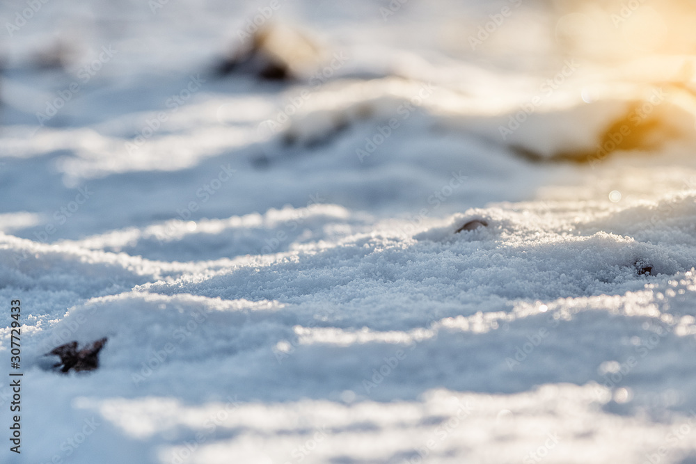Fototapeta premium Abstract winter background with sunlight on snow.