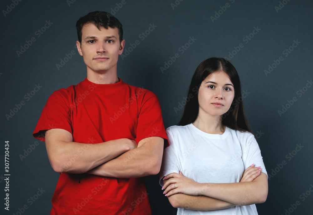 Guy and girl on a gray background Guy and girl on a gray background