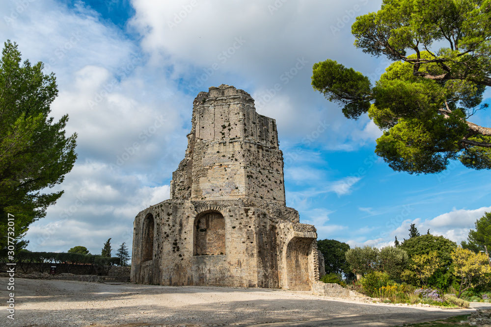 View on the old Magne tower in the Gardens of the Fountain in Nimes city in southern France