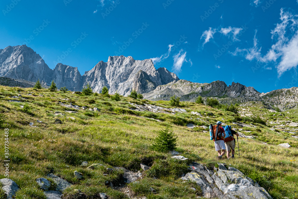 Backpacker in the italian alps