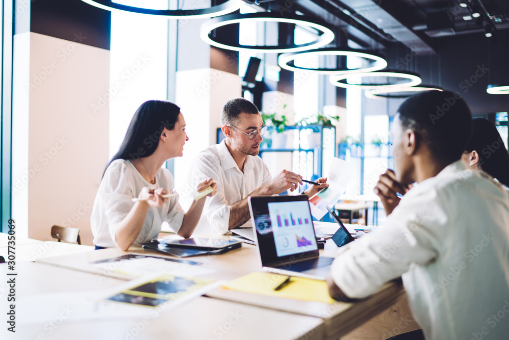 Boss discussing idea with diverse business team Boss discussing idea with diverse business team