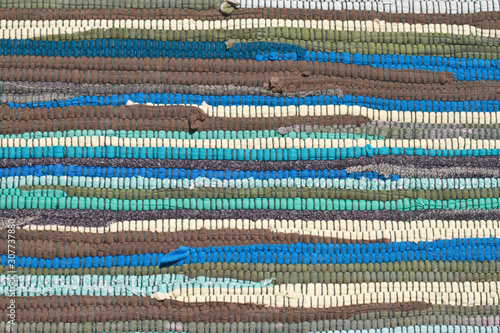 detail of blue rug with horizontal lines