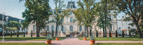Backside of Potocki Palace in Lviv, Western Ukraine in summer sunlight day panorama. Ancient architectural monument built in 1880. National Art Gallery 2019 year. Landmark of the Lvov city photo