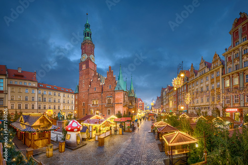 Christmas market on Rynek square at dusk in Wroclaw, Poland