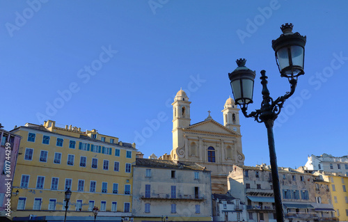 View of St Jean Baptiste cathedral in old port of Bastia ,second largest corsican city and main entry point to the island photo