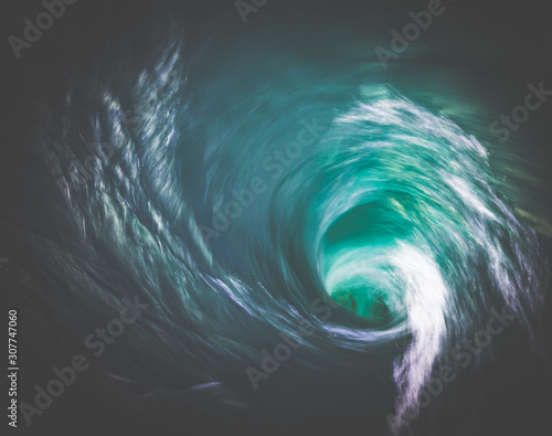 Water vortex with saturated natural colour.
