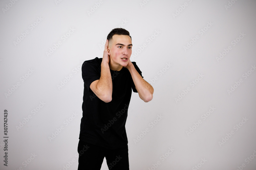 Emotion of surprise. The guy's shocked by what's going on. White background. Emotion of surprise. The guy's shocked by what's going on. White background.