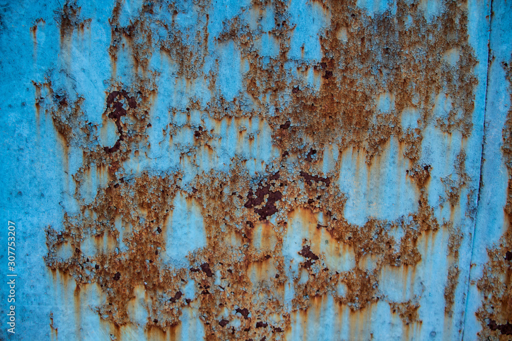 Rusty background. Shabby. Blue background. Rust. Vintage. Interesting texture.