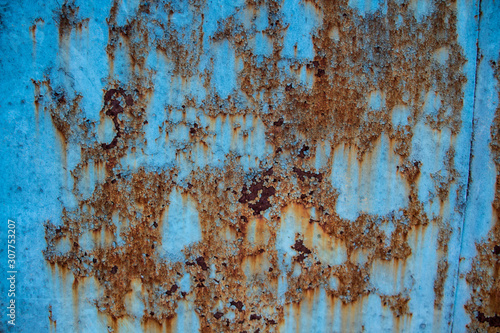 Rusty background. Shabby. Blue background. Rust. Vintage. Interesting texture.
