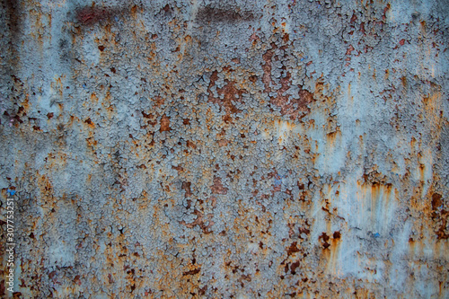 Rusty background. Shabby. Blue background. Rust. Vintage. Interesting texture.