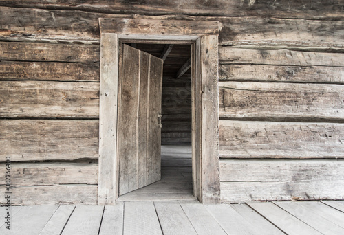 Open Front Door. Rustic abandoned log cabin with open front door in the Great Smoky Mountains.