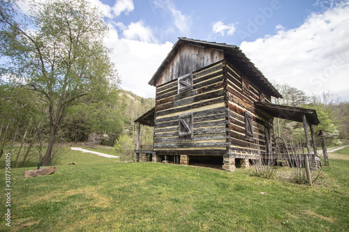 Old Kentucky Cabin. This is a historic log cabin on display in a national park and on public owned parklands.  It is not a privately owned property or residence.  photo