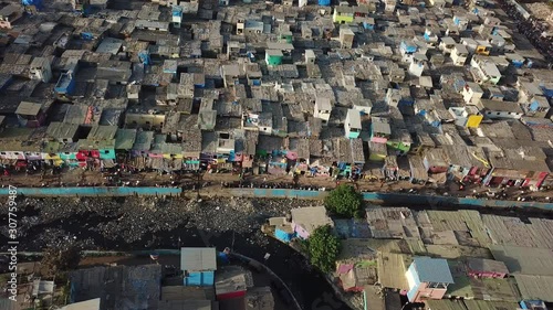 Aerial View on Dharavi Mumbai Slum With Filthy Water Canal, India. Poor Housing Without Sewage System