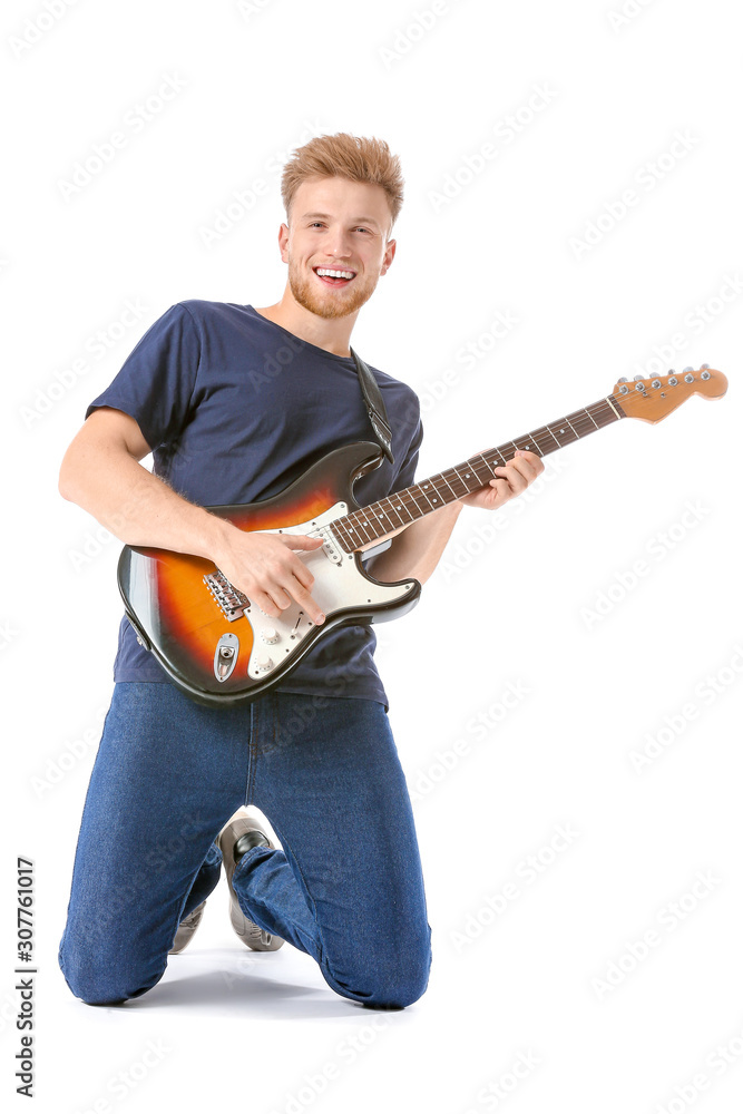 Handsome man playing guitar on white background Handsome man playing guitar on white background