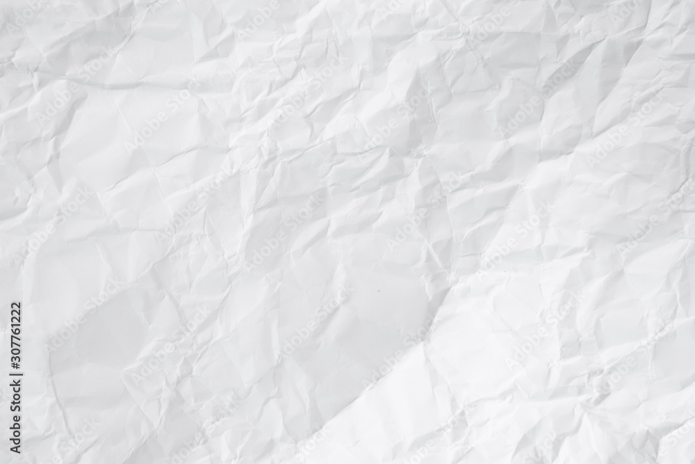 white and gray crumpled paper texture background. crush paper so that it becomes creased and wrinkled. white and gray crumpled paper texture background. crush paper so that it becomes creased and wrinkled.
