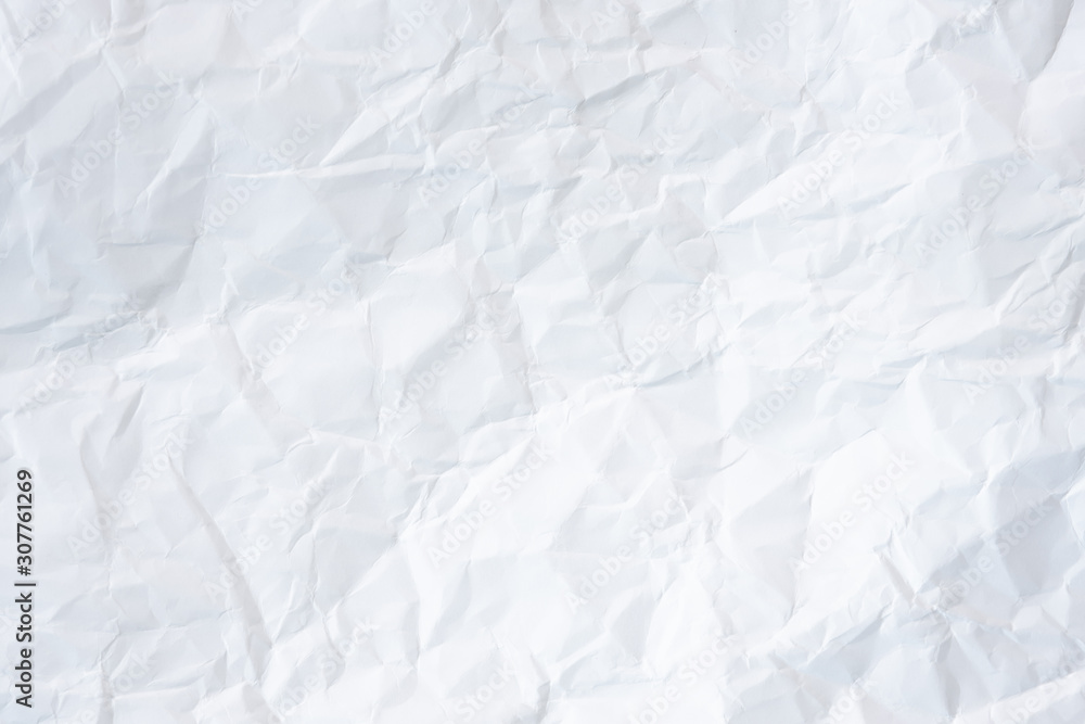 white and gray crumpled paper texture background. crush paper so that it becomes creased and wrinkled. white and gray crumpled paper texture background. crush paper so that it becomes creased and wrinkled.