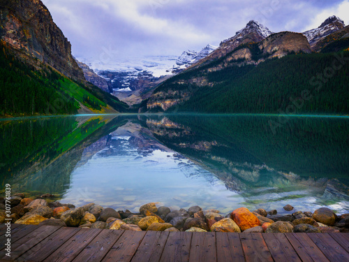 Perfect mountain Lake With Wooden Dock Lake Louise Banff Alberta Canada