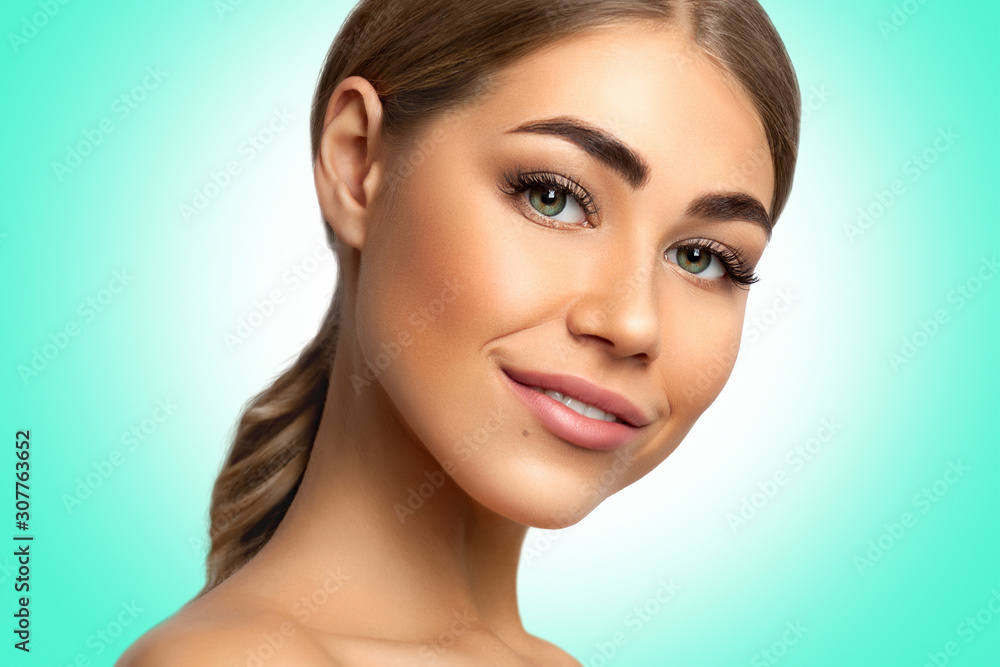 Fototapeta premium Beautiful woman cyan-mint color background. Aqua Menthe color