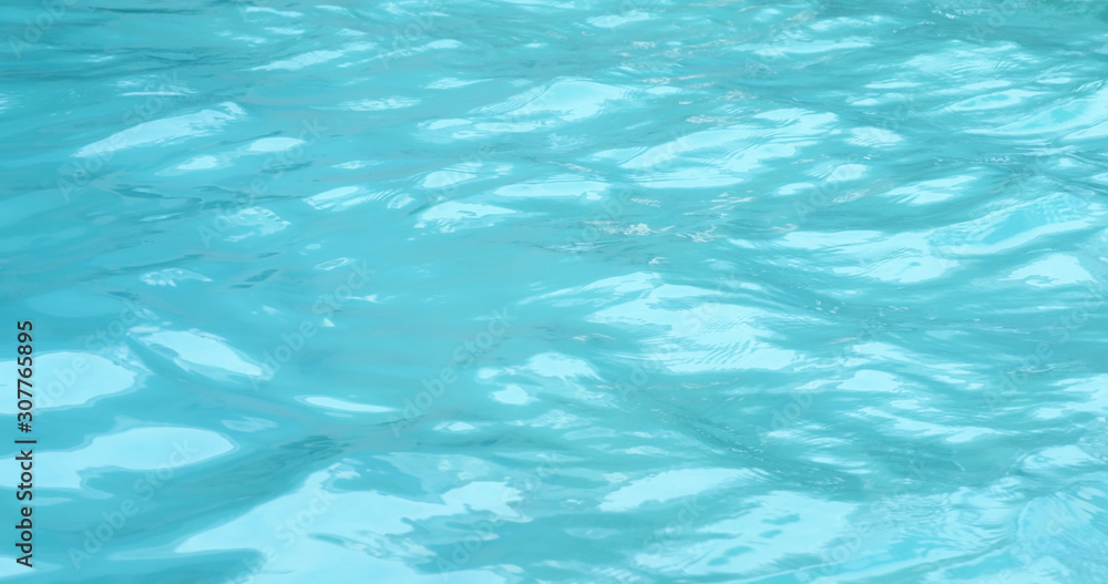 Swimming pool water wave in blue color Swimming pool water wave in blue color