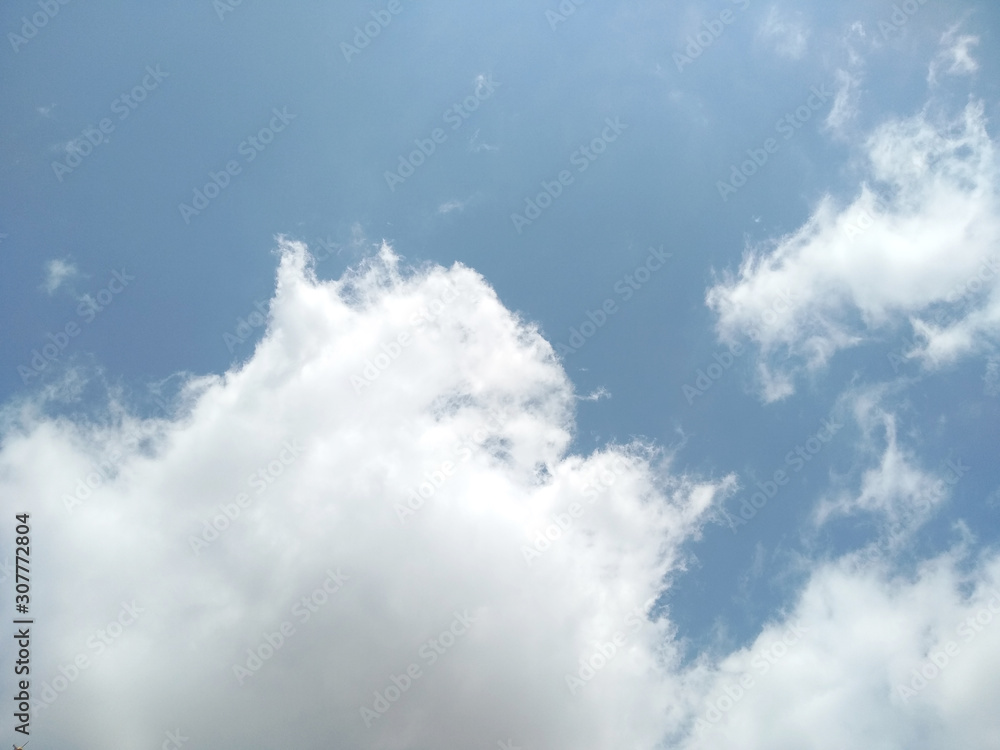 Beautiful blue sky with clouds background. Blue sky background with clouds. Beautiful blue sky with clouds background. Blue sky background with clouds.