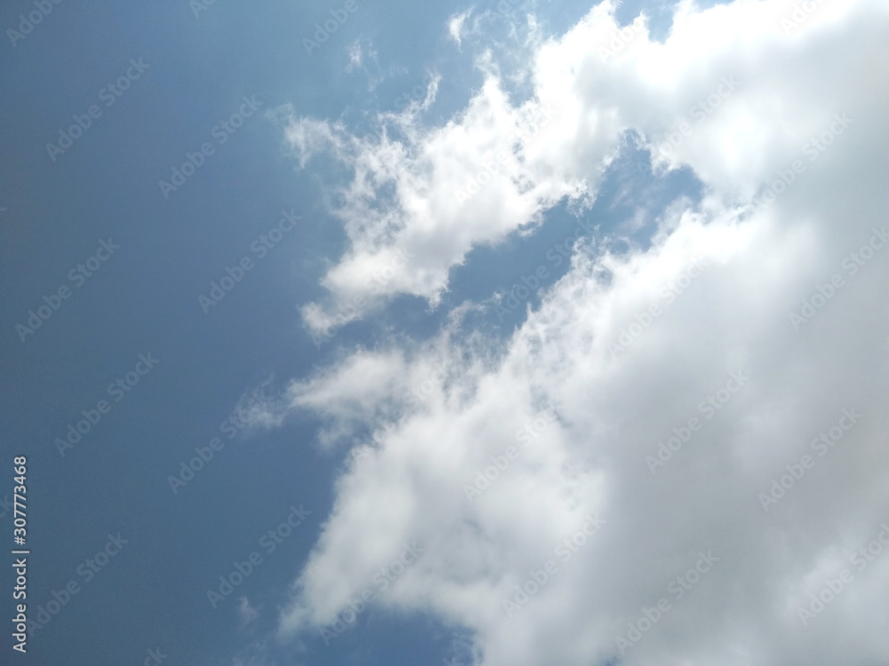 Beautiful blue sky with clouds background. Blue sky background with clouds. Beautiful blue sky with clouds background. Blue sky background with clouds.