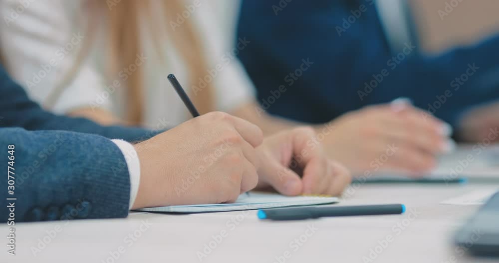 Workplace of an office worker. Hands on the table, close-up. Workplace of an office worker. Hands on the table, close-up.