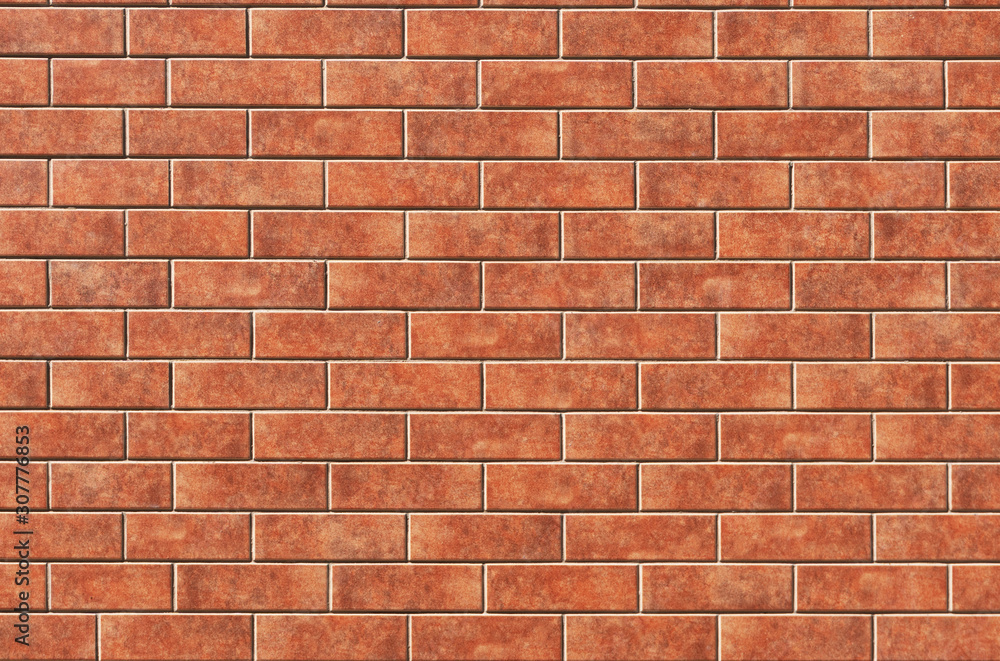 The red brick wall texture on the grunge background can be used for interior decoration. The red brick wall texture on the grunge background can be used for interior decoration.