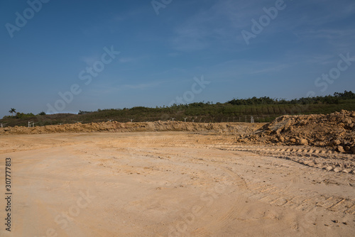 Outdoor construction site yellow sand ground surface space landscape