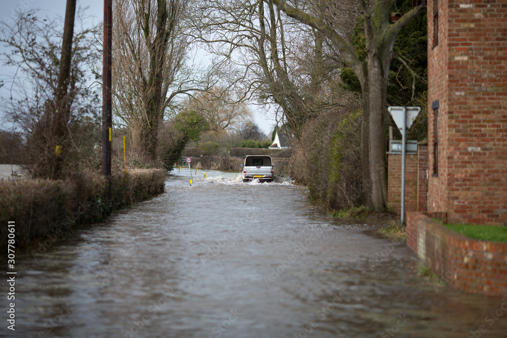 Flooded road, Somerset Levels, Somerset, UK Flooded road, Somerset Levels, Somerset, UK