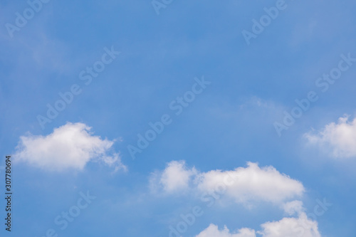 Soft and Clear Blue sky and soft white clouds at day time for background.