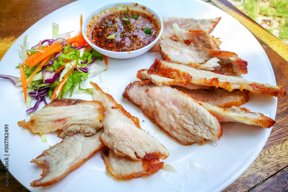 Grilled Pork of Thai food style for eat with Somtum. Grilled Pork of Thai food style for eat with Somtum.