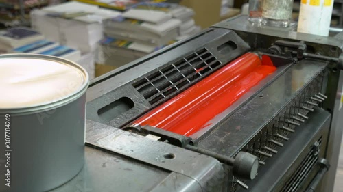 Rolls deliver paint into the printing machine