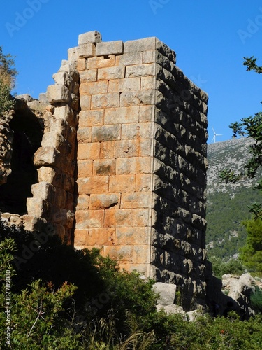 A tower of the ancient, 4th century BC, fortress of Aigosthena, in Attica, Greece photo