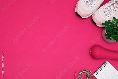 Flat lay with diet diabetes weight loss concept - Sneakers, tape measure, glucometer on a pink background