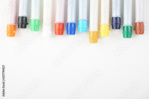 water colour tubes on a drawing art paper